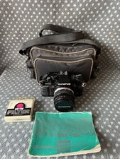 Olympus OM40 Program 35mm Film Camera SLR Tested Working w Bag Manual DX Black