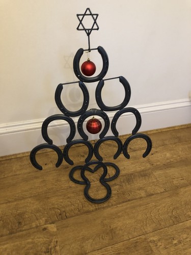 Hand crafted horseshoe - hand,