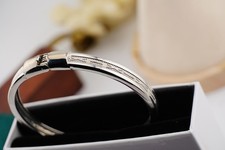 Silver-Tone Filigree Bangle by