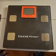 Thane Fitness body fat scale black and red metric and standard digital readout 