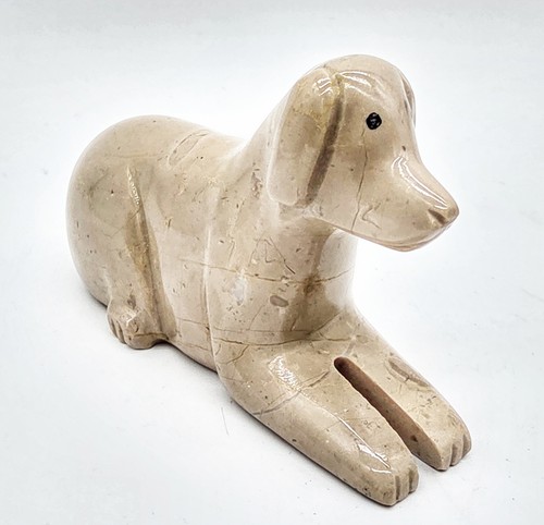 Tan soapstone recumbent dog - recumbent,