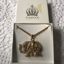 POMPOOS GOLD TONE ELEPHANT