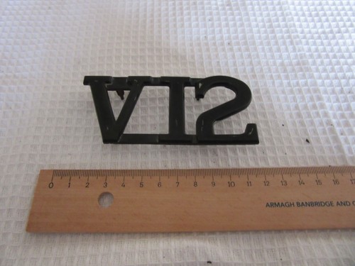V12 vintage car - , badge