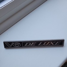 Vintage original CAR BADGE EMBLEM V6 DELUXE 