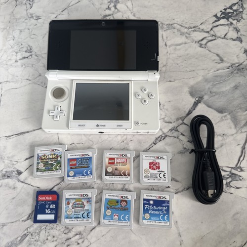 Nintendo 3ds and charger - nintendo,