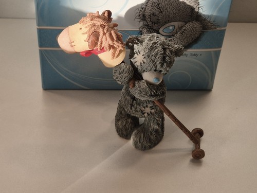 You bear figurine - to,