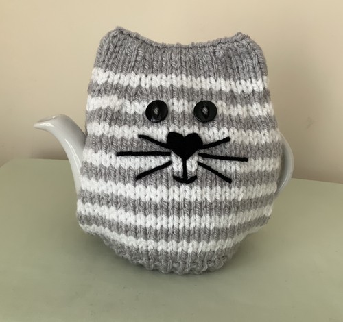 New hand knitted silver - hand,