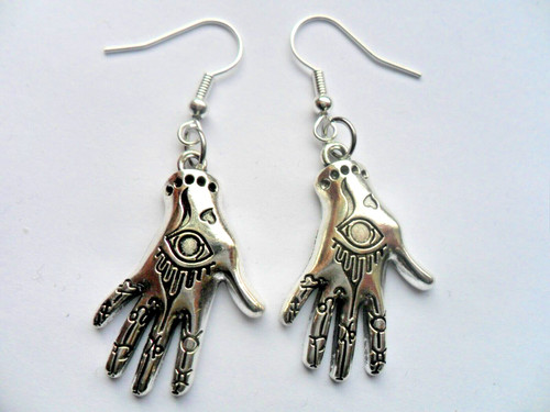Unusual pair eye palm - of,