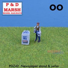 NEWSPAPER STAND & SELLER