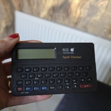 Vintage 80's Seiko Instruments Roget's Thesaurus & Spell Checker SII w/ Case