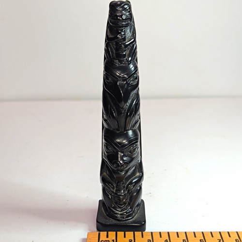 Polished black carved totem - polished,