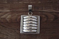 Native American Indian Jewelry Sterling Silver Ribbed Pendant by Thomas Charley