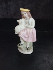 Staffordshire Pottery Figurine, specifically depicting a girl with a lamb.