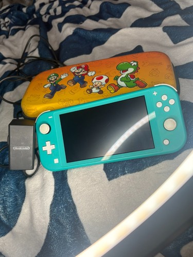 Nintendo switch lite turquoise - nintendo,