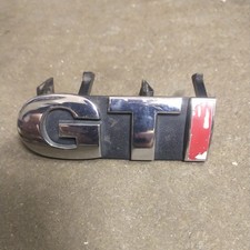 GENUINE VW POLO 6N2 GTI FRONT GRILLE BADGE 6N0853679D/F