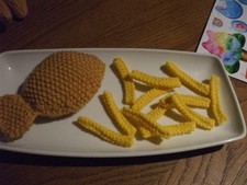 Hand knitted food fish - hand, and