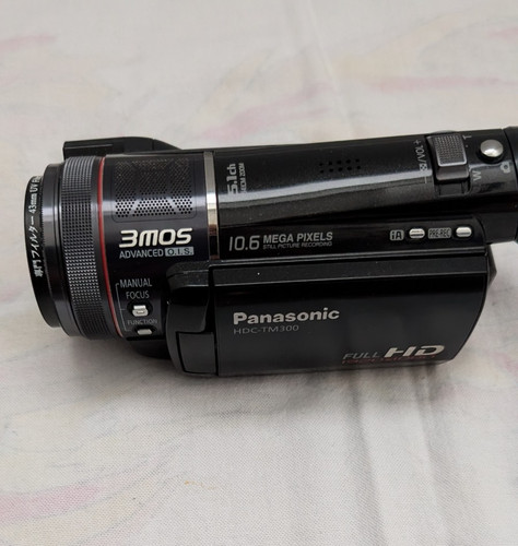 Panasonic hdc tm300 full - full, hd