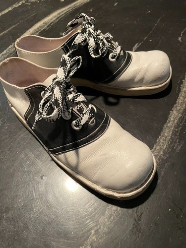 Vintage black white saddle - &,