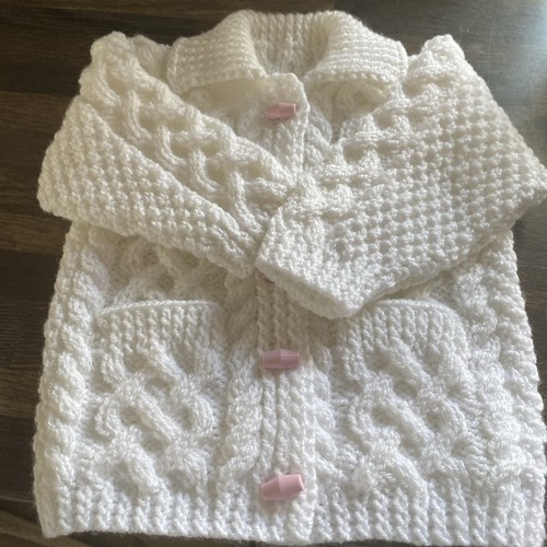 Hand knitted aran - hand,