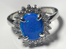 Sterling silver '925' and oval fire opal/clear stone cocktail ring band size M
