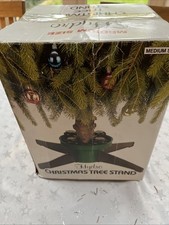 Christmas Tree Stand.Medium Size. Fill With Water For Sturdy Support. Good condi
