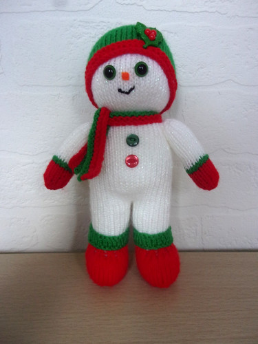 Hand knit snowman - hand,