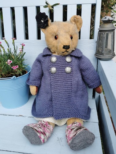 Hand knitted teddy bear - hand,