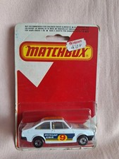  MATCHBOX SUPERFAST 1980 SEALED FORD ESCORT RS2000  MINT CAR.NUMBER 9 USED CARD.
