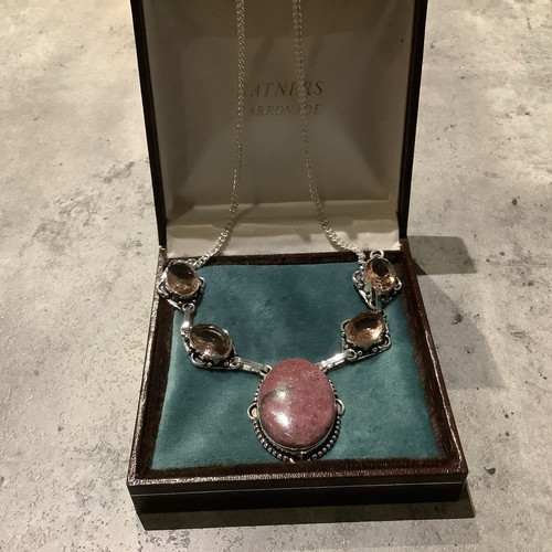 Silver rhodonite and - ,