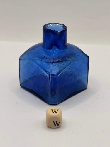 Old blue glass ink bottle