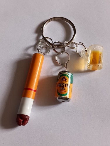 Holsten pils cigarette butt - holsten,