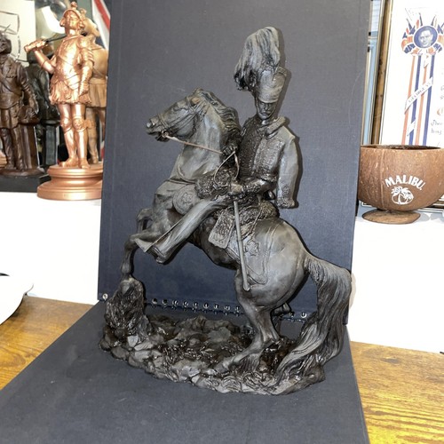 Cast bronze figure mounted - cast,