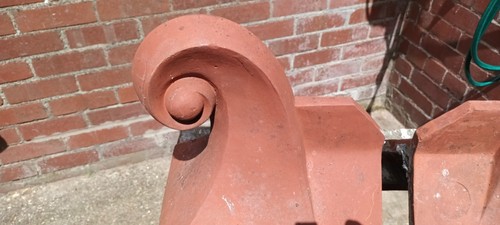 Pair terracotta scroll - pair,