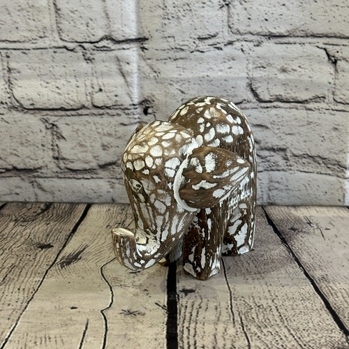 Brown wooden elephant with - brown,