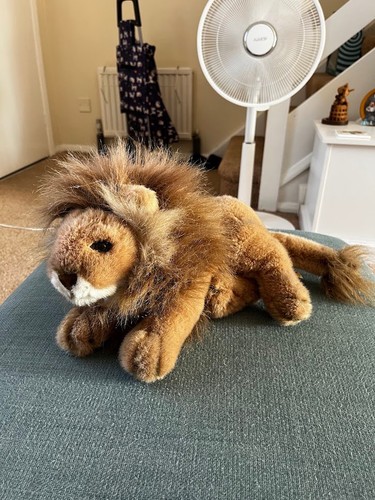 Lying lion especially - lying, for