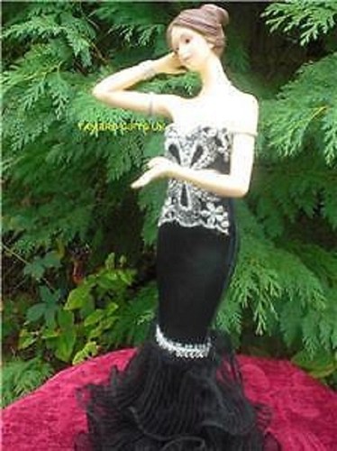 Black silver lady figurines - &,