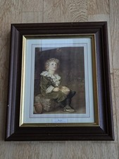 A framed print titled