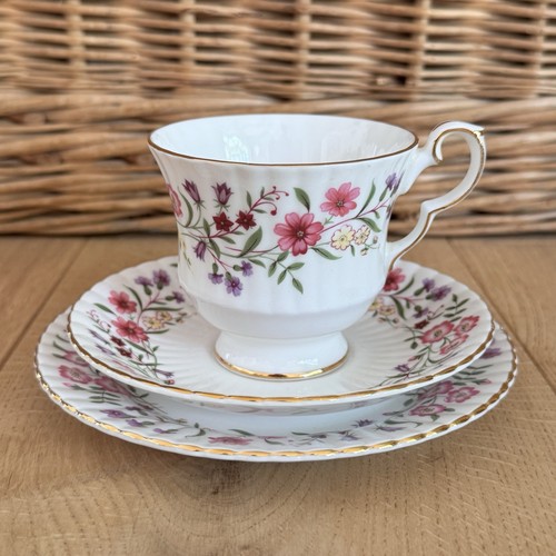Vintage teacup saucer with - &,