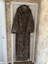 Genuine Slanket, a cosy blanket with sleeves and foot pocket for warmth. VGC.