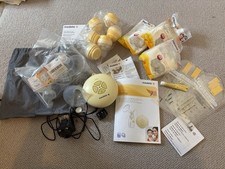 Medela Swing Breast Pump starter kit With Bags, Teats, Pads, Cream