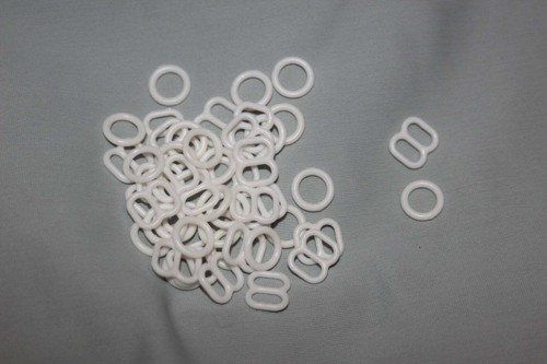 Pieces white plastic bra - 60,