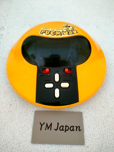 Tomy handheld packman game - handheld,