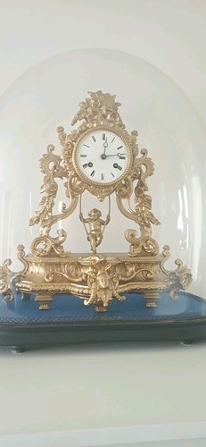 Swinging cherub clock with - clock,