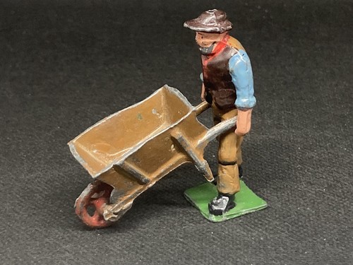 Gardener with wheelbarrow - gardener,