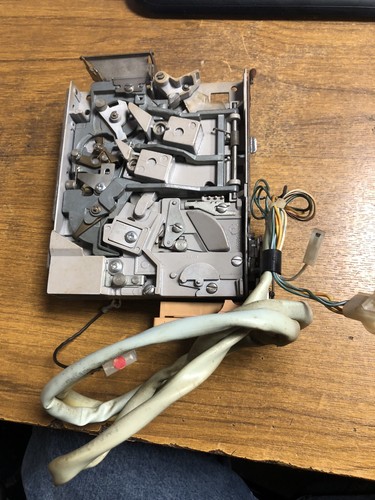 Rockola coin mechanism with - coin,