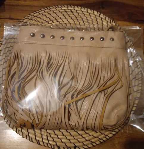 Tan colour medium sized - colour,