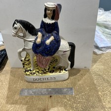 A Staffordshire figure 'Duchess, height 24 cm Circa 1837-1875
