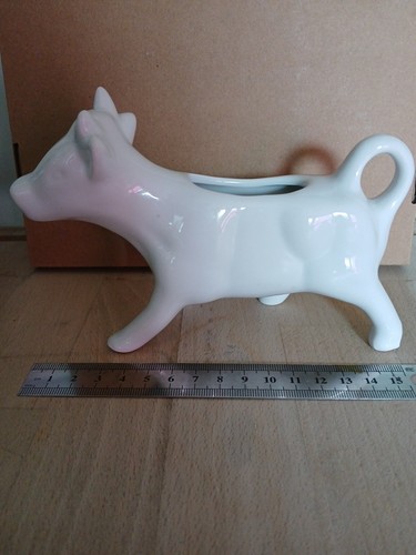 White ceramic cow shaped - ceramic,