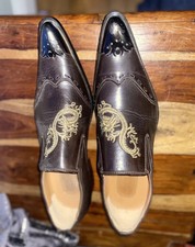 brown dragon design wingtip style pointed toe leather shoes with metal tip