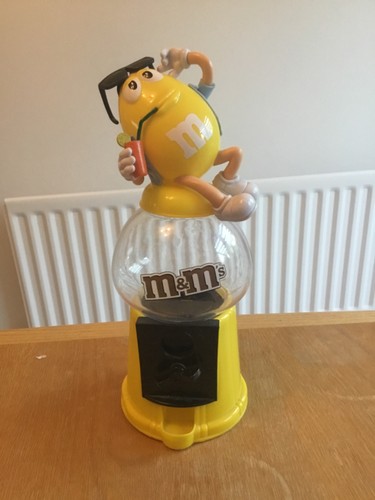 Yellow dispenser - m&ms,